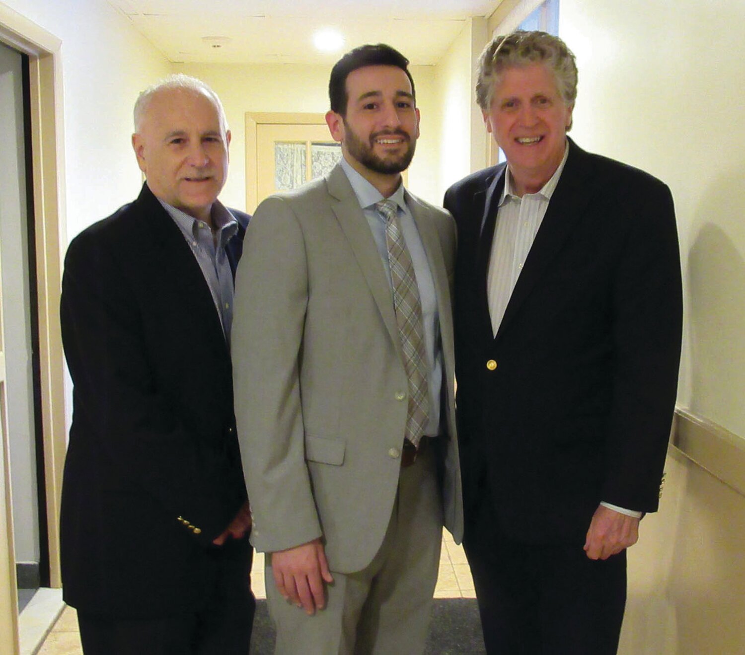 HAPPIER TIMES: Former Johnston Mayor Joseph Polisena Sr. and his son Joseph M. Polisena Jr. posed with then-Lt. Gov. Dan McKee at the younger Polisena’s first political fundraiser in 2019. McKee went on to become Rhode Island’s governor and Polisena succeeded his father as mayor. A fissure seems to have formed between the pair of former political allies and “family friends.”